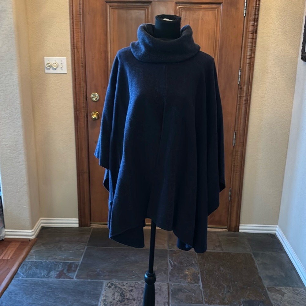 Beautiful navy cape with cowl neck, perfect to wear with jeans or slacks.